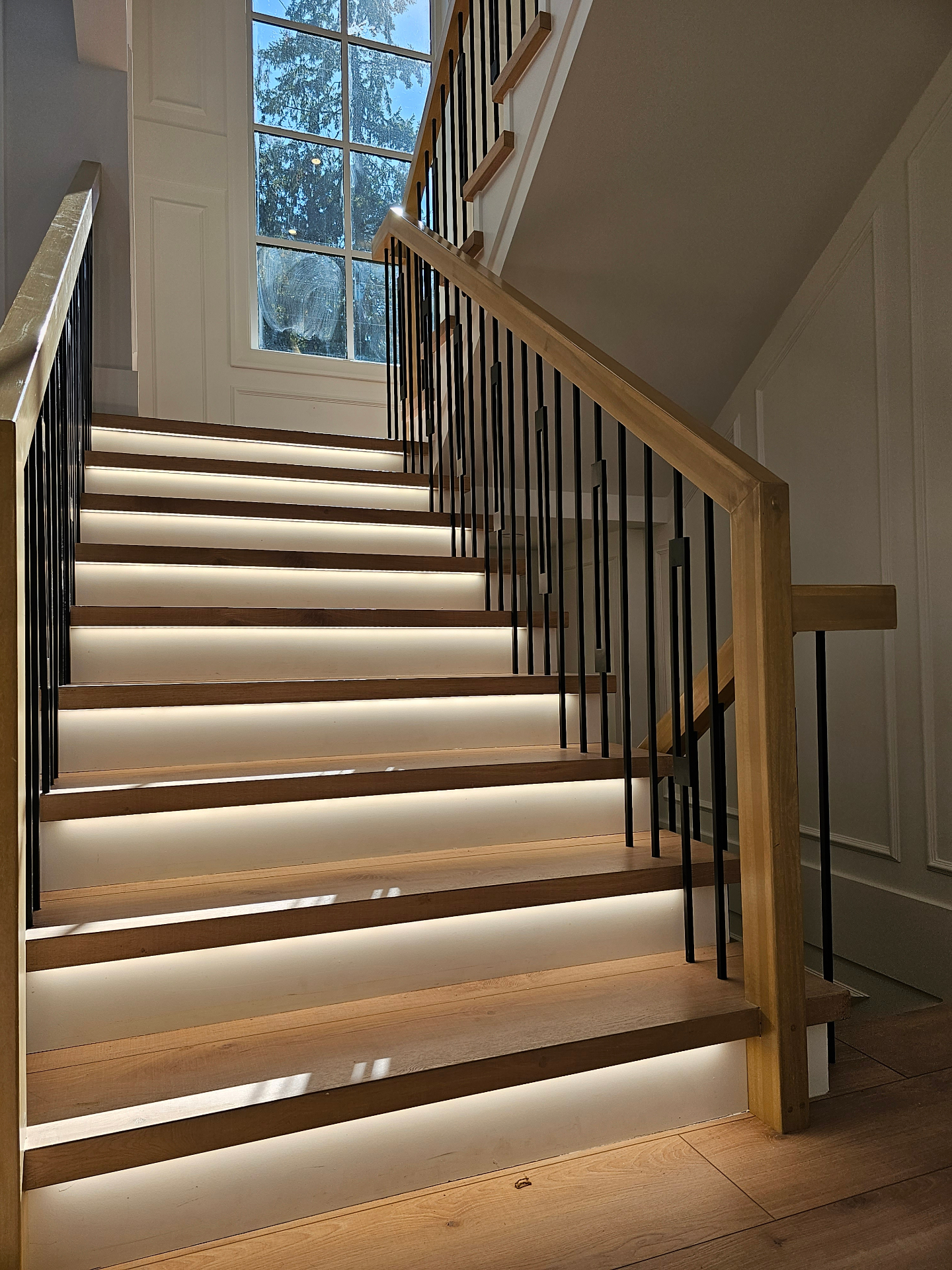 White oak stair treads installed to a consistent rise